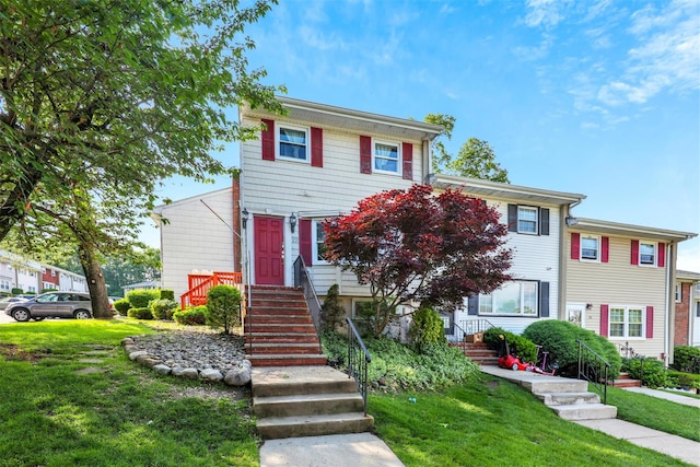22 Sharon Dr, Spring Valley, NY 10977 - colonial inspired home with a front lawn