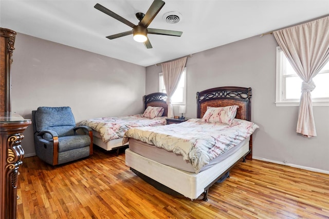 22 Sharon Dr, Spring Valley, NY 10977 - bedroom with wood finished floors and ceiling fan
