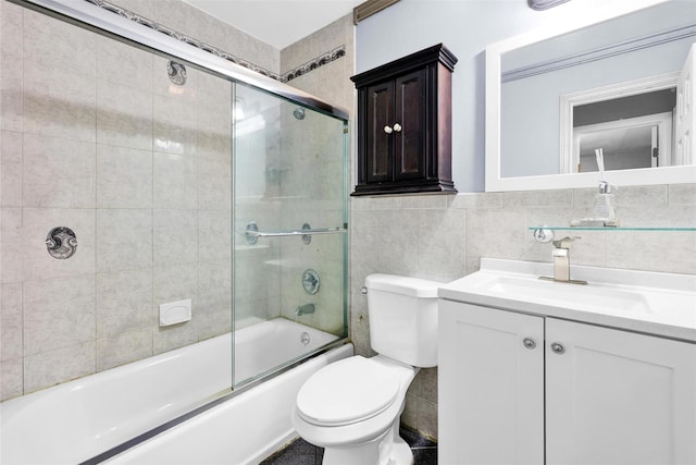 22 Sharon Dr, Spring Valley, NY 10977 - full bathroom with tile walls, vanity, and enclosed tub / shower combo