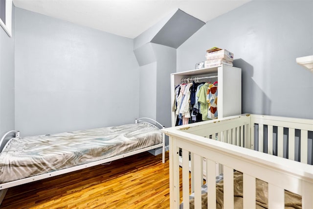 22 Sharon Dr, Spring Valley, NY 10977 - bedroom with a closet and wood finished floors