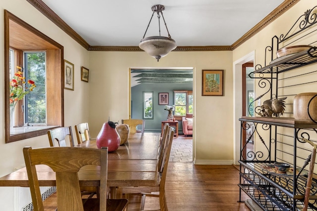 77 Nancy Blvd, Merrick, NY 11566 - dining space featuring wood finished floors and crown molding