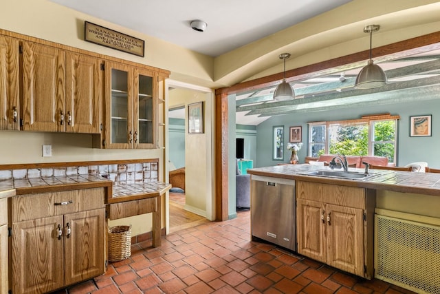 77 Nancy Blvd, Merrick, NY 11566 - kitchen with dishwasher, tile counters, pendant lighting, glass insert cabinets, and brick floors