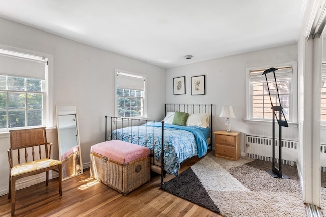 77 Nancy Blvd, Merrick, NY 11566 - bedroom with wood finished floors and radiator heating unit