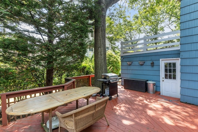 77 Nancy Blvd, Merrick, NY 11566 - wooden terrace with a grill and outdoor dining space