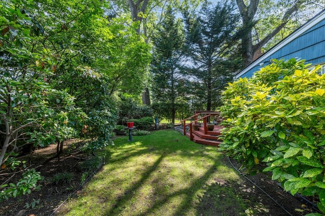 77 Nancy Blvd, Merrick, NY 11566 - view of grassy yard with a wooden deck