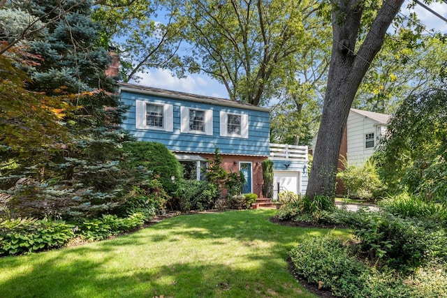 77 Nancy Blvd, Merrick, NY 11566 - colonial house featuring a chimney and a front yard