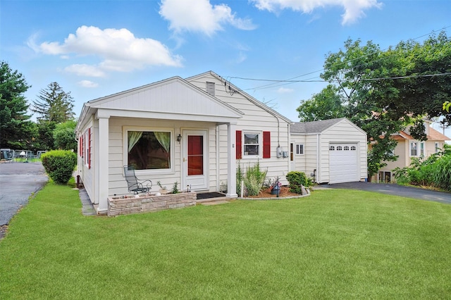 9 Grandview Ave, Middletown, NY 10940 - view of front facade with driveway, an attached garage, and a front lawn
