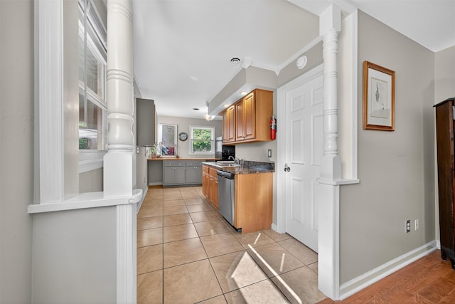 9 Grandview Ave, Middletown, NY 10940 - kitchen with stainless steel dishwasher and light tile patterned floors
