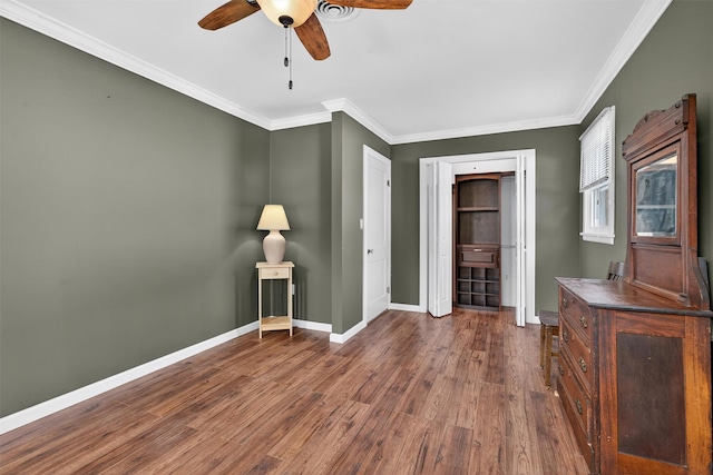9 Grandview Ave, Middletown, NY 10940 - unfurnished bedroom with dark wood-type flooring, crown molding, and ceiling fan