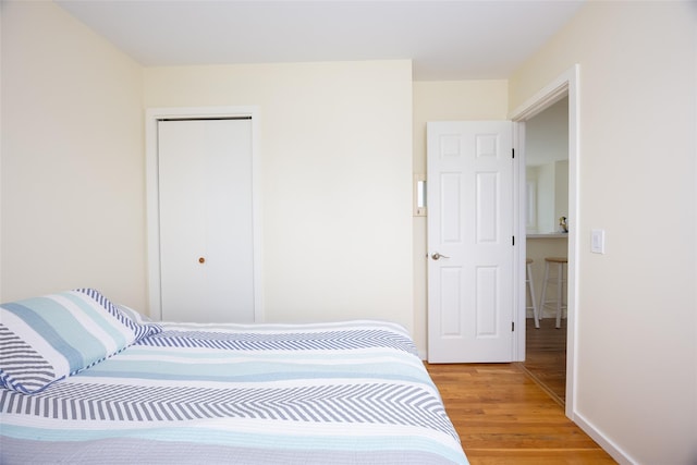 10 Bayview Rd, Remsenburg, NY 11960 - bedroom with light wood-type flooring and a closet