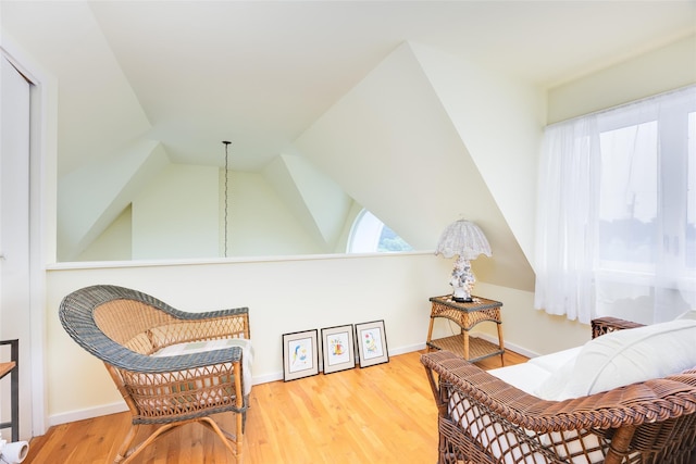 10 Bayview Rd, Remsenburg, NY 11960 - living area with wood finished floors and vaulted ceiling
