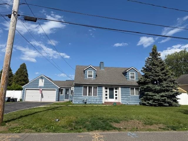 624 Adams Ave, Lindenhurst, NY 11757 - cape cod home with driveway, a garage, a chimney, and a front yard