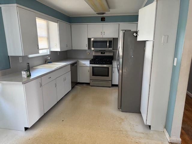 624 Adams Ave, Lindenhurst, NY 11757 - kitchen with appliances with stainless steel finishes, light countertops, and white cabinetry