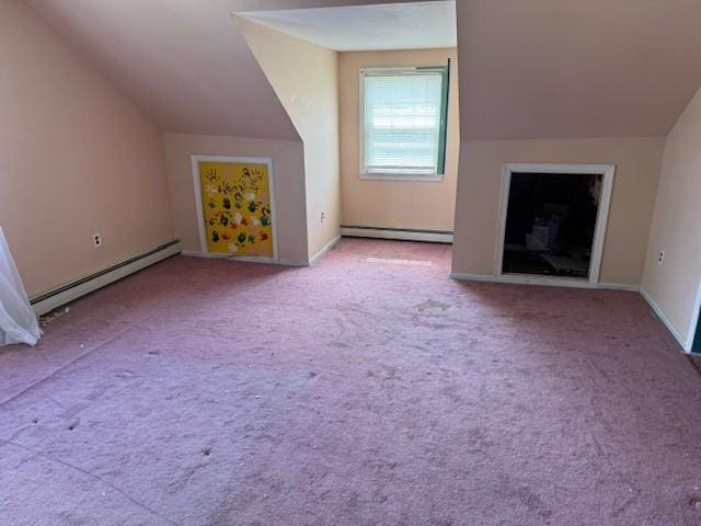 624 Adams Ave, Lindenhurst, NY 11757 - bonus room with baseboard heating, a baseboard heating unit, vaulted ceiling, and carpet floors