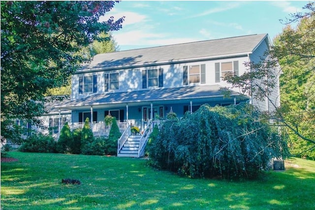 306 S Centerville Rd, Middletown, NY 10940 - colonial house featuring stairs, a front yard, and a porch