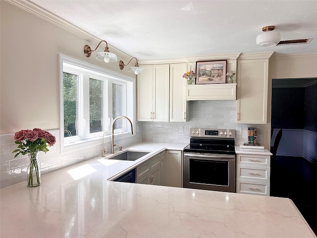 306 S Centerville Rd, Middletown, NY 10940 - kitchen with stainless steel electric range oven, light stone countertops, tasteful backsplash, crown molding, and custom range hood