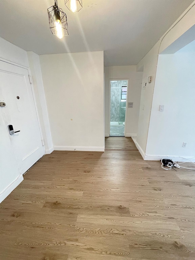 8385 116th St Unit 4B, Kew Gardens, NY 11418 - unfurnished room featuring wood finished floors and baseboards