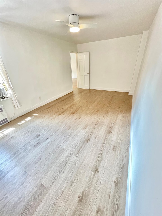 8385 116th St Unit 4B, Kew Gardens, NY 11418 - empty room featuring wood finished floors and a ceiling fan