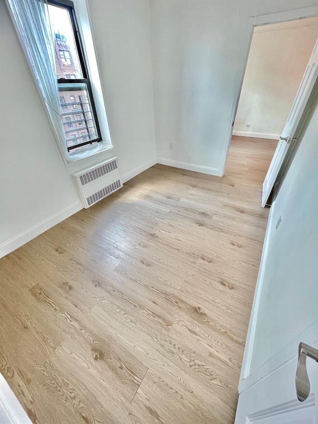 8385 116th St Unit 4B, Kew Gardens, NY 11418 - spare room with wood finished floors and baseboards