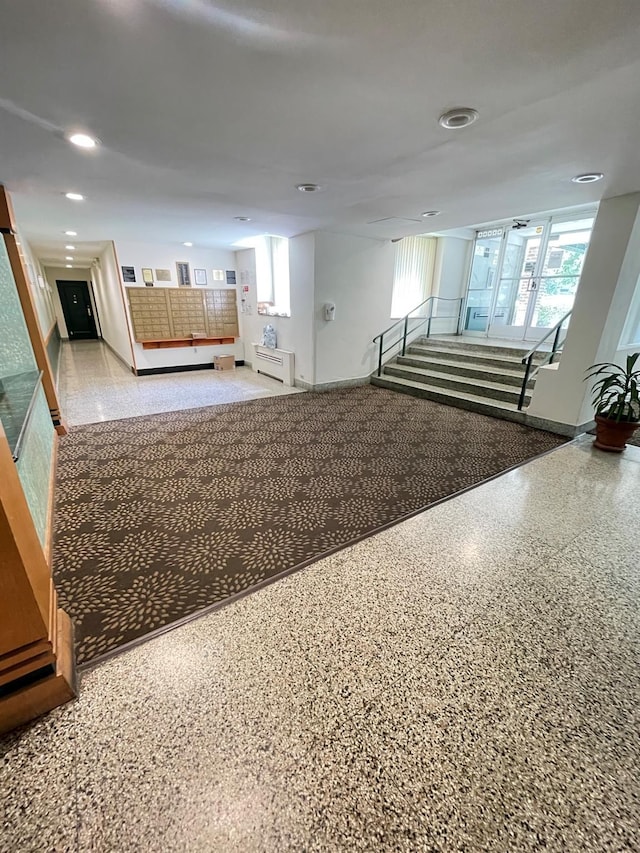 8385 116th St Unit 4B, Kew Gardens, NY 11418 - unfurnished living room with plenty of natural light, recessed lighting, and speckled floor
