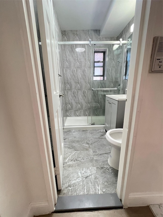 8385 116th St Unit 4B, Kew Gardens, NY 11418 - bathroom with marble look tiles, a stall shower, and vanity