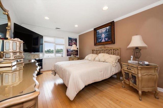 600 Clarence Ave Unit 1J, Bronx, NY 10465 - bedroom featuring crown molding, light wood-type flooring, and recessed lighting