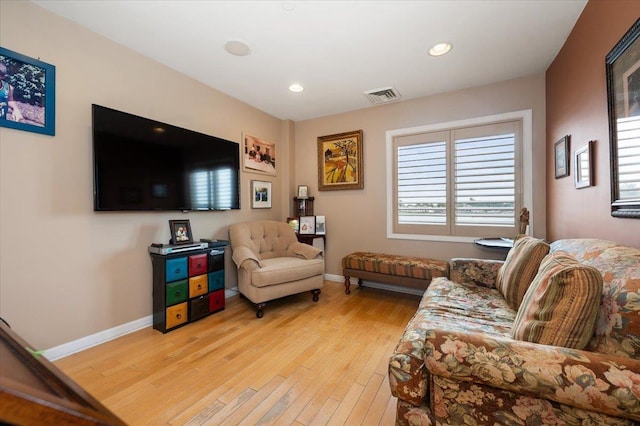 600 Clarence Ave Unit 1J, Bronx, NY 10465 - living room with light wood-style floors and recessed lighting