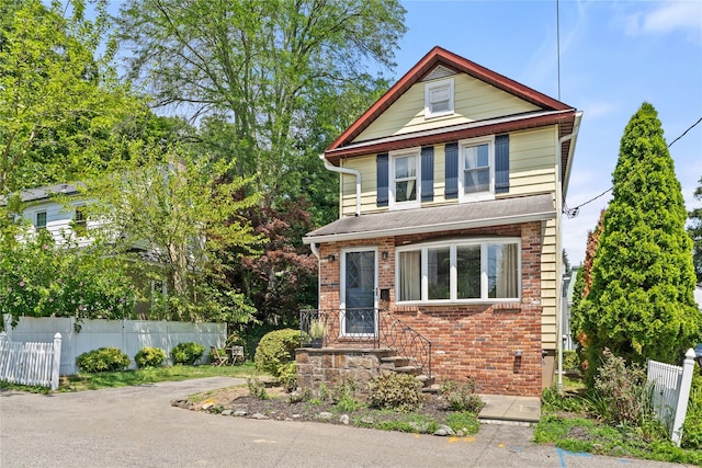 1 Saunders St, Hastings-On-Hudson, NY 10706 - american foursquare style home featuring brick siding