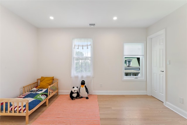 1 Saunders St, Hastings-On-Hudson, NY 10706 - unfurnished bedroom with wood finished floors and recessed lighting