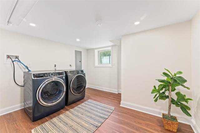 1 Saunders St, Hastings-On-Hudson, NY 10706 - washroom featuring wood finished floors, washer and clothes dryer, electric panel, and recessed lighting