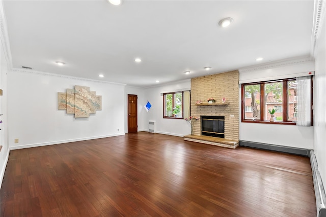 154-70 11th Ave, Beechhurst, NY 11357 - unfurnished living room featuring ornamental molding, wood finished floors, a fireplace, recessed lighting, and baseboard heating
