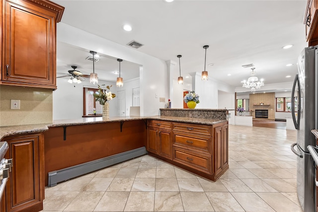 154-70 11th Ave, Beechhurst, NY 11357 - kitchen featuring baseboard heating, brown cabinetry, a ceiling fan, backsplash, and recessed lighting