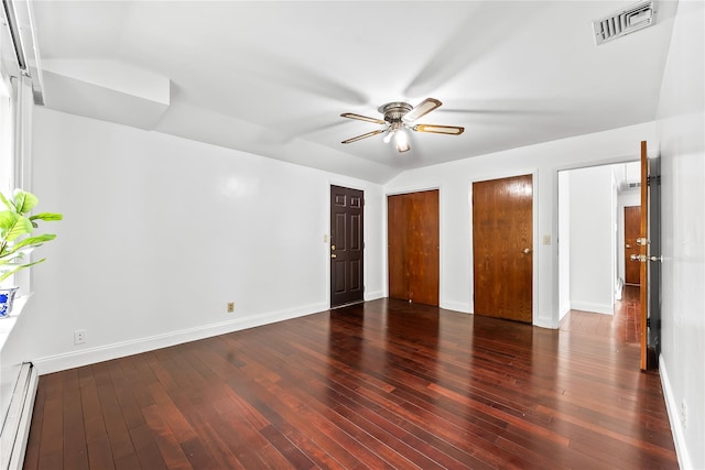154-70 11th Ave, Beechhurst, NY 11357 - unfurnished bedroom with a baseboard radiator, wood-type flooring, multiple closets, and a ceiling fan