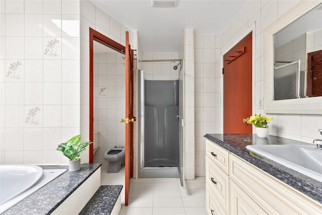154-70 11th Ave, Beechhurst, NY 11357 - bathroom featuring tile walls, a shower stall, vanity, tile patterned flooring, and a bidet