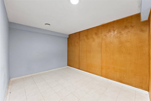 154-70 11th Ave, Beechhurst, NY 11357 - unfurnished room with baseboards and wood walls