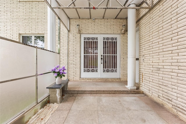 154-70 11th Ave, Beechhurst, NY 11357 - property entrance featuring french doors and brick siding