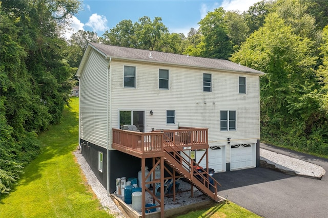 7 Glen Ct, Pawling, NY 12564 - rear view of property with an attached garage, asphalt driveway, a wooden deck, stairs, and a lawn