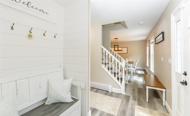 7 Glen Ct, Pawling, NY 12564 - mudroom with wood finished floors and a chandelier