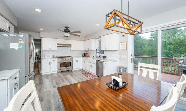 7 Glen Ct, Pawling, NY 12564 - dining area with ceiling fan, light wood-type flooring, and recessed lighting