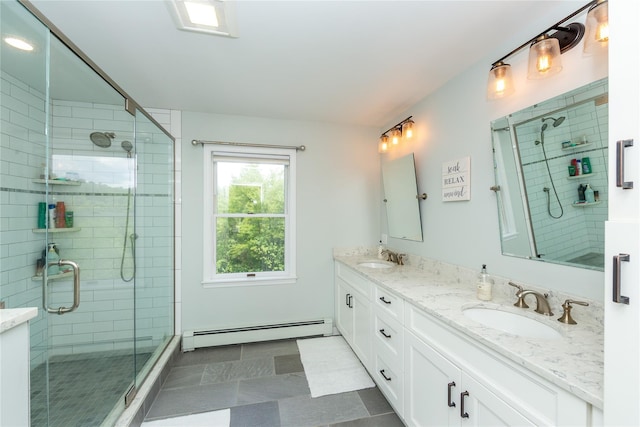 7 Glen Ct, Pawling, NY 12564 - bathroom featuring a baseboard radiator, double vanity, and a shower stall