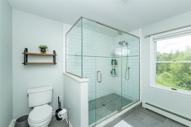 7 Glen Ct, Pawling, NY 12564 - full bath with a baseboard radiator, a stall shower, healthy amount of natural light, and tile patterned floors