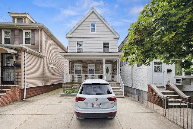 1639 Hone Ave, Bronx, NY 10461 - view of front of home with a porch and stone siding