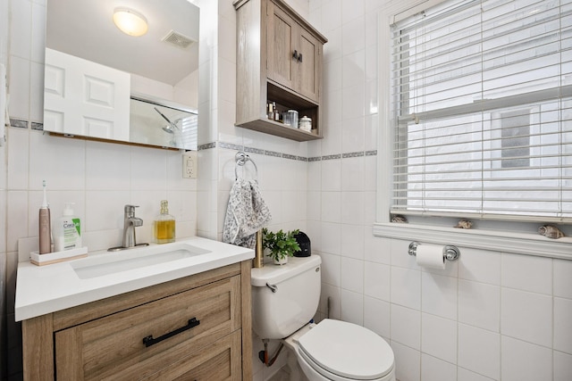 1639 Hone Ave, Bronx, NY 10461 - full bath with tile walls, vanity, decorative backsplash, and a shower