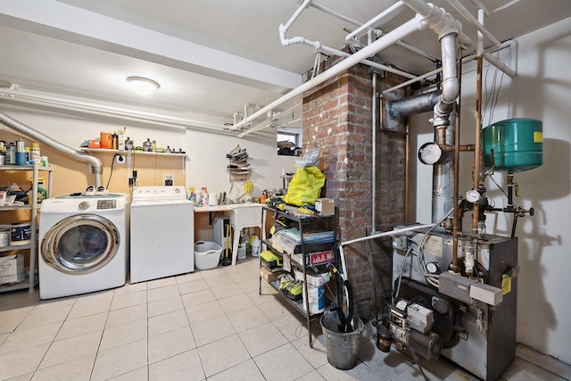 1639 Hone Ave, Bronx, NY 10461 - washroom featuring washer and clothes dryer, tile patterned floors, and a heating unit