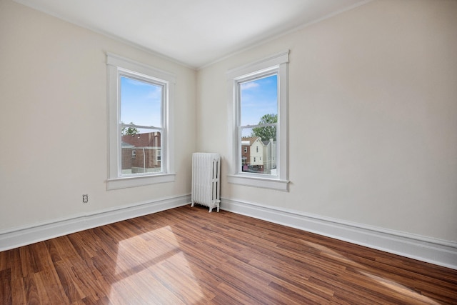 1639 Hone Ave, Bronx, NY 10461 - empty room with radiator and wood finished floors