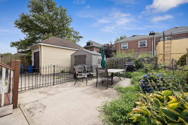 1639 Hone Ave, Bronx, NY 10461 - view of patio with outdoor dining area, a storage shed, and area for grilling