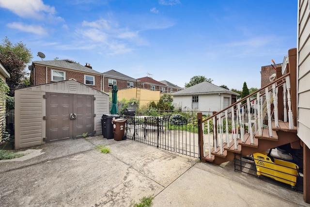1639 Hone Ave, Bronx, NY 10461 - gate with a shed, a patio area, and a residential view