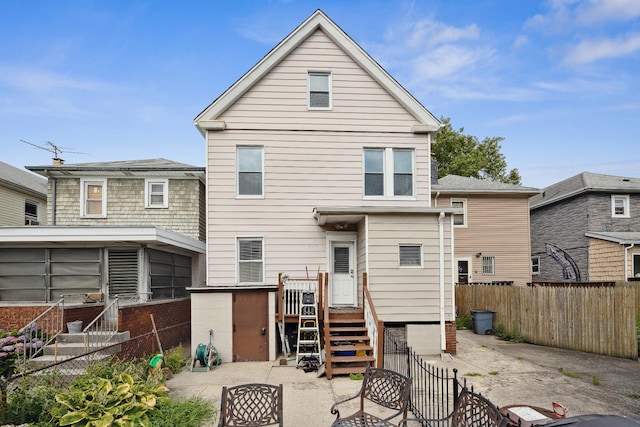 1639 Hone Ave, Bronx, NY 10461 - rear view of house with a fenced backyard
