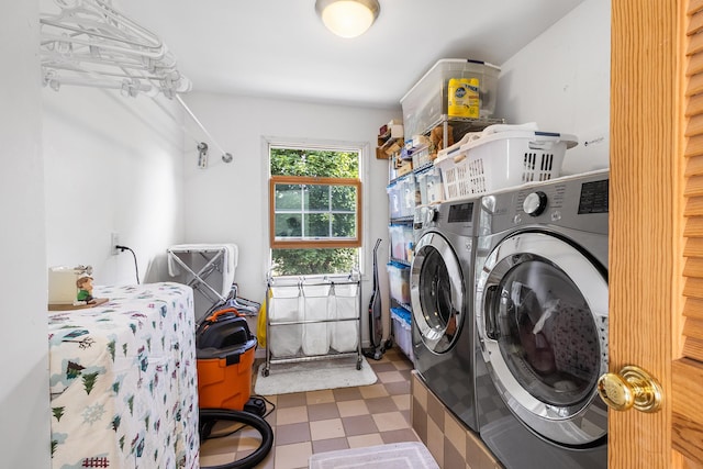 42 E Webster St, Merrick, NY 11566 - washroom featuring washing machine and dryer and tile patterned floors