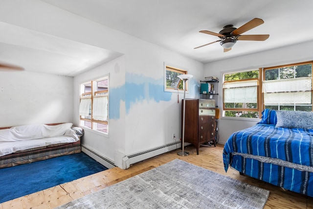 42 E Webster St, Merrick, NY 11566 - bedroom featuring wood finished floors and a ceiling fan